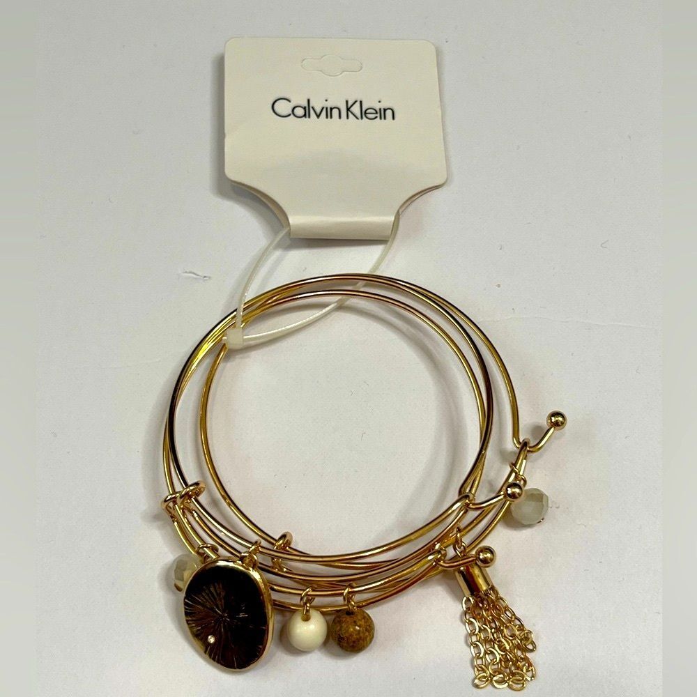 NWT Women’s Calvin Klein Gold Tone Bangle Bracelets With Charms #234